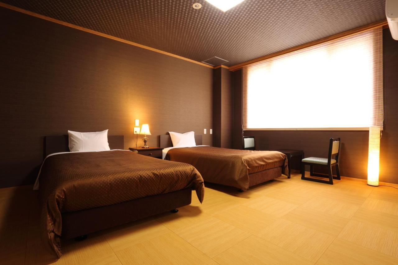 האקובה Hotel Oak Forest מראה חיצוני תמונה